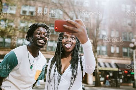 Young Couple Having Fun In Downtown Seattle Together Stock Photo