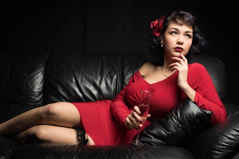 Woman In Red Dress Laying On Couch Hd Wallpaper Wallpaper Flare
