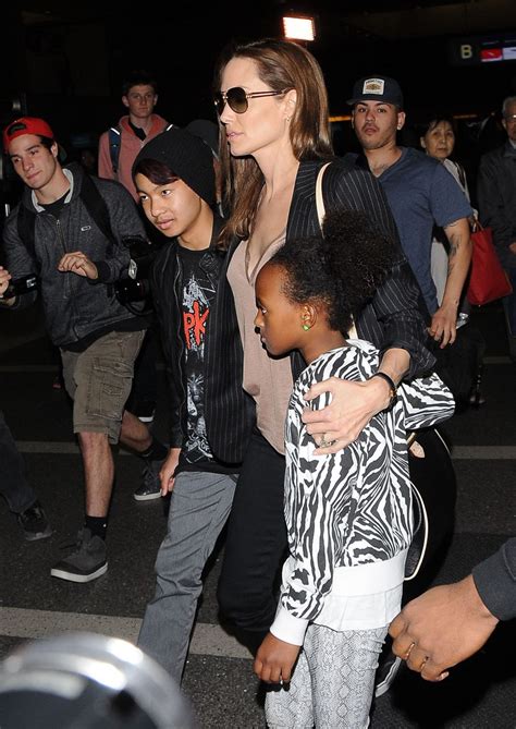 She carries herself with so much pride and dignity and this attitude is reflected in all she's involved in. Angelina Jolie and Her Kids at LAX Airport in Los Angeles ...