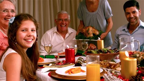 The dates for events during december are limited, so get your merry on early, and send out invitations before calendars are as full as a christmas morning stocking. Family Having Christmas Dinner at Stock Footage Video (100% Royalty-free) 5917058 | Shutterstock