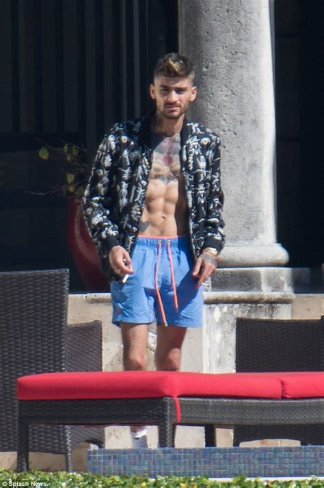 Shirtless Zayn Malik Continues To Recover From Gigi Hadid Split Daily Mail Online