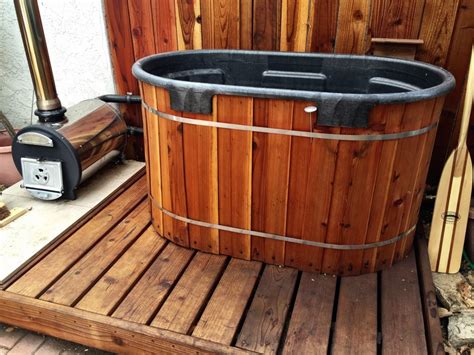 This outdoor stock tank bathtub is perfect for those of you who want to enjoy winter while soaking in warm water. How to Build a Stock Tank Hot Tub | Island Hot Tub
