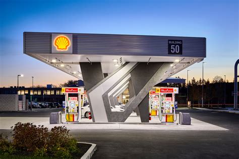 Pure And Freeform Modern Gas Station Design Gotham Patina And Old Dirty Bronze Column Covers