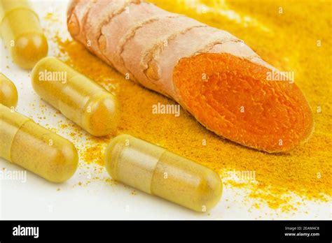 Curcuma Capsules And Powder With Root Stock Photo Alamy