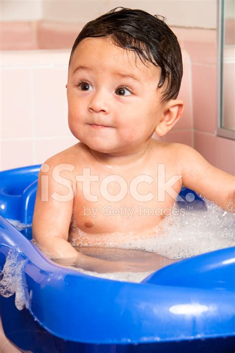 Baby Boy In Bathtub Stock Photos