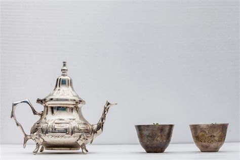 Free Photo Arabic Tea In Cups With Teapot On White Table