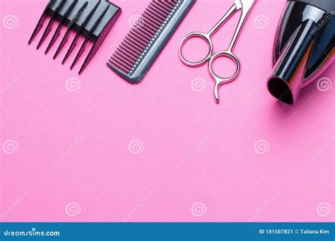 A Set Of Tools For The Hairdresser Hairdryer Scissors Comb On A