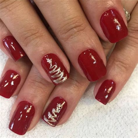 Christmas gel nail art is basically the usual christmas theme with an additional layer of transparent gel that somehow gives texture and thickness to the designs. Newest Christmas Nail Art Ideas For 2019 - Femeline in ...