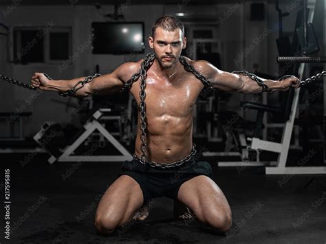 Muscular Man Slave In Chains In Gym The Prisoner Stock Photo Adobe Stock