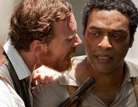 Chiwetel ejiofor (left) as solomon northup, a free black man who is kidnapped and sold into slavery, and michael fassbender (right) as edwin epps, one of the men who buy him, in. Brutal but brilliant: 12 Years A Slave review | Daily Mail ...