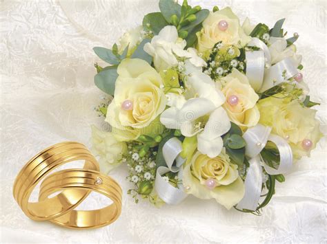 Read reviews for eggplant & green hydrangea, ranunculus & peony bouquet. Wedding Bouquet With Gold Wedding Rings On White B Stock ...