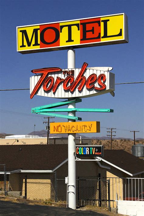 Torches Motel Photograph By Mike Mcglothlen Pixels