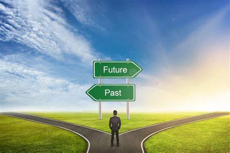 Businessman Concept Of Choose The Correct Way Between Past Or Future