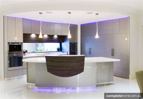 Mali kitchen island this kitchen island in espresso finish is crafted from solids and composite wood, strengthened with stainless steel hardware. TREND ALERT: gorgeous curved kitchen bench designs