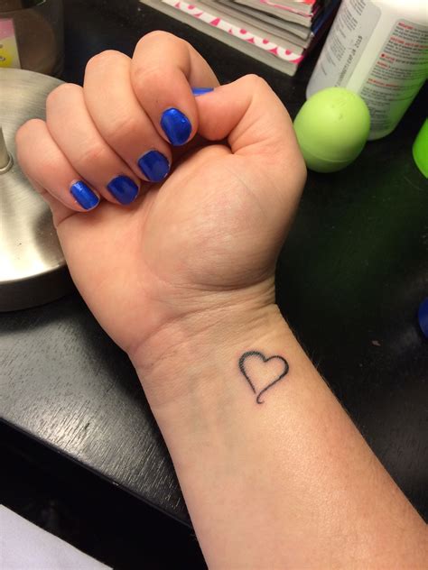 Pin By Tristan Stringer On Tattoo Ideas Heart Tattoo Wrist Wrist Tattoos For Guys Small