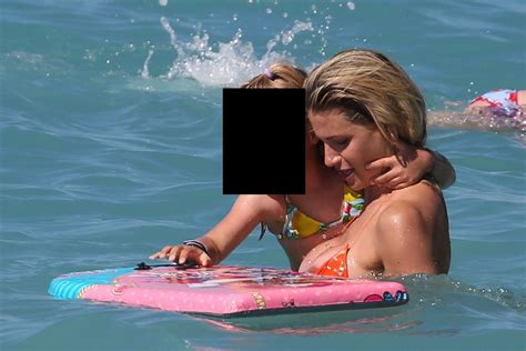 Michelle Hunziker Flashes Her Boobs On The Beach 27 Photos Thefappening