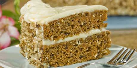 Tender carrot cake full of cozy spices & topped with sweet cream cheese frosting. Two-Tiered Spiced Carrot Cake with Orange-Cream Cheese ...