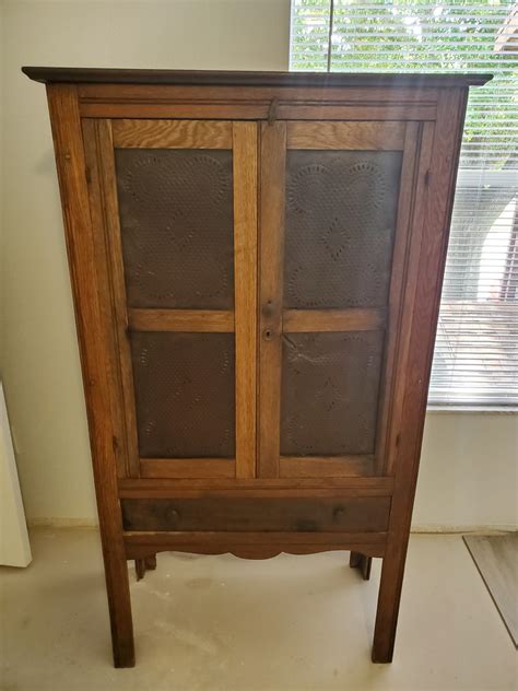 What kind of cabinet has a pie safe? Age and Value of an Antique Pie Safe? | ThriftyFun