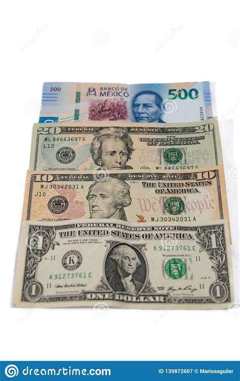 Money currency us to mexico. Mexican Currency Between Dollars Stock Image - Image of ...