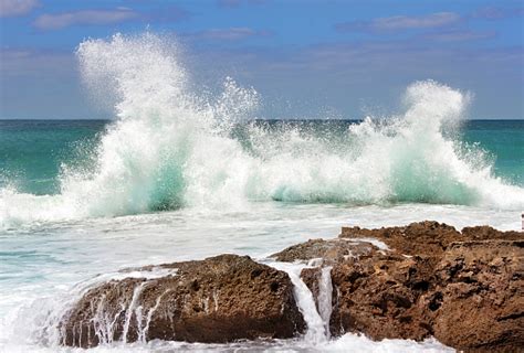 Sea Wave Crashing On Rocks Stock Photo Download Image Now Istock