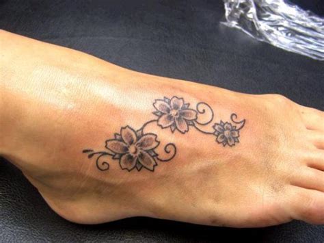 It is hard to find small foot tattoos as most boys and girls prefer to have large size tattoos on foot. 100's of Foot Tattoos for Girls Design Ideas Pictures Gallery