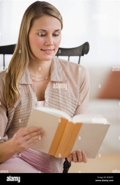 Woman Reading Book Stock Photo Alamy