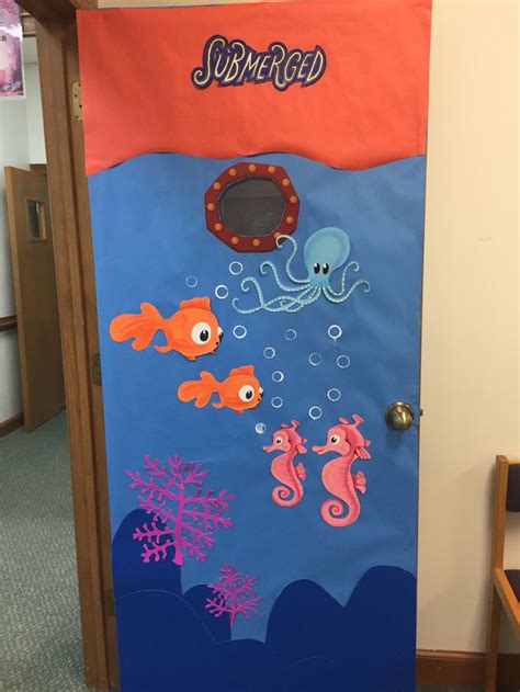 A Door Decorated With An Ocean Theme And Sea Animals On The Front