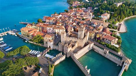 Aerial View To The Town Of Sirmione Popular Travel Destination On Lake