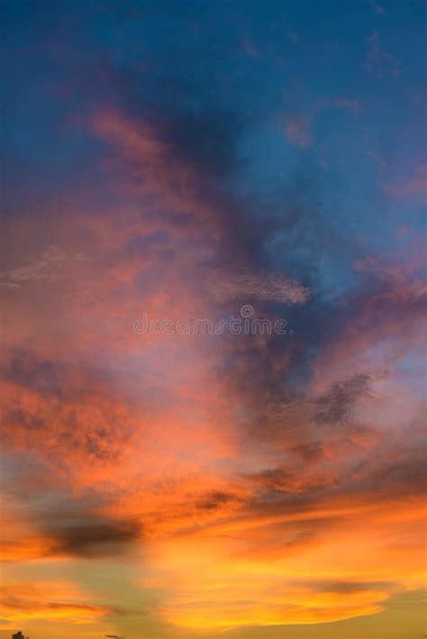 Beautiful Twilight Sky With Orange And Blue Colour Dramatic Cloud