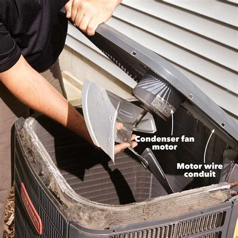 An Air Conditioner Being Installed To The Side Of A House With