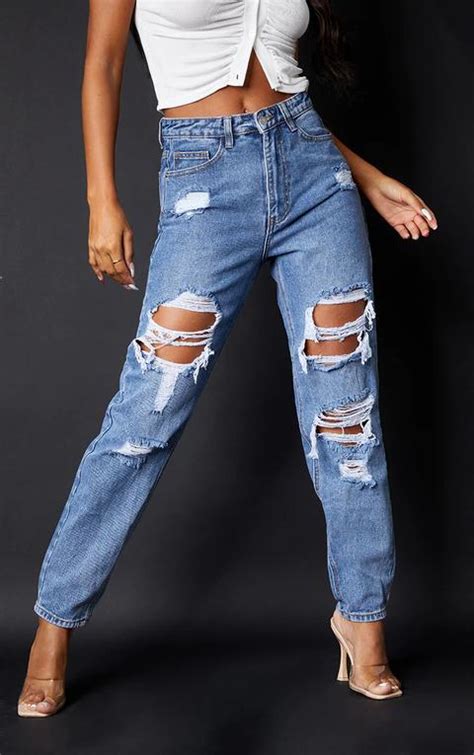 Prettylittlething Mid Blue Ripped Mom Jeans From Prettylittlething On