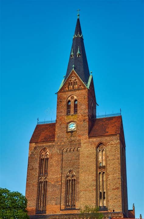 Medieval Gothic Church With A Bell Tower In Friedland Stock Photo