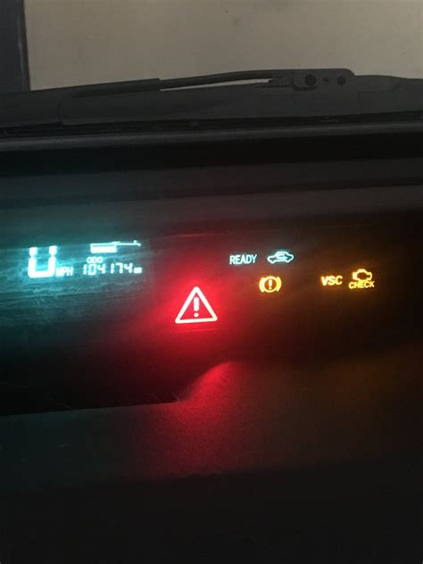 Lexus LS460 with orange triangle with Exclamation - Toyota, Lexus, and