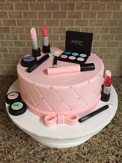 I had total free reign over the design of this one with the exception of strict instructions to make it girly. Makeup Birthday Cake - CakeCentral.com