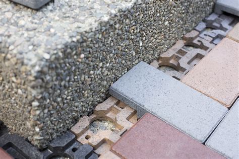 If you are going to mortar you flagstone pavers to secure them, mix up your mortar and keep it consistently wet. How to Install AZEK Pavers | Dunn DIY
