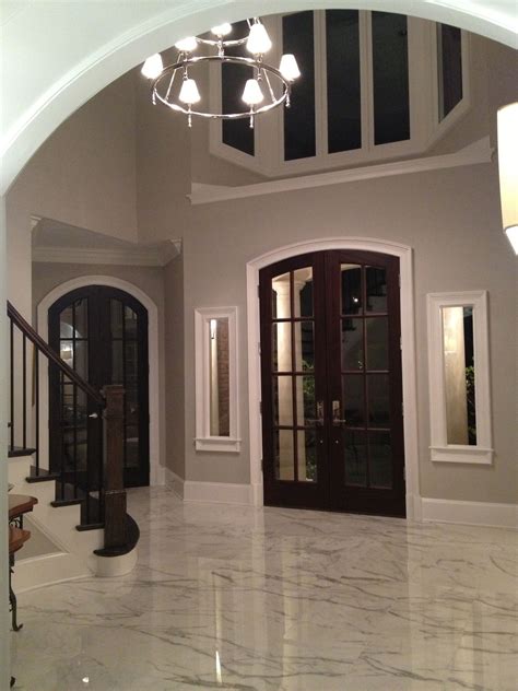 New Foyer Tile Lighting And Doors Marble Foyer Foyer Flooring