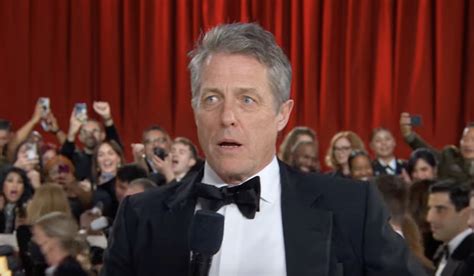 A Close Read Of Hugh Grants Painfully Awkward Oscars Red Carpet