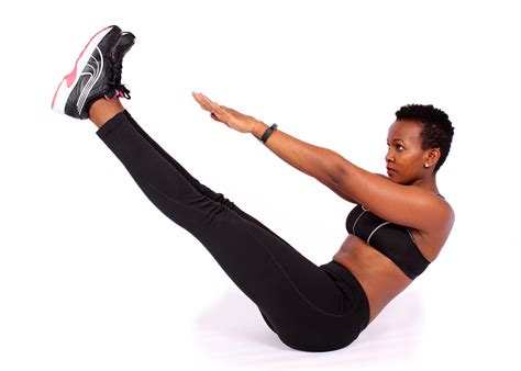 Fit African Woman Doing V Ups Ab Exercise