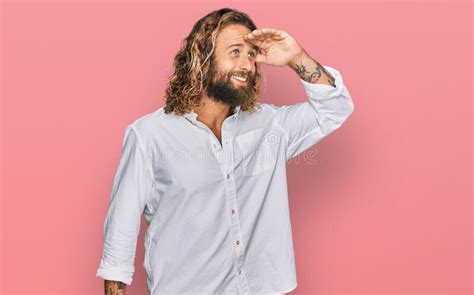 Handsome Man With Beard And Long Hair Wearing Casual Clothes Very Happy