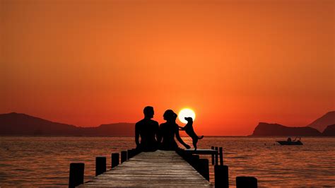 Download Wallpaper 1920x1080 Couple Sunset Pier Silhouette Full Hd