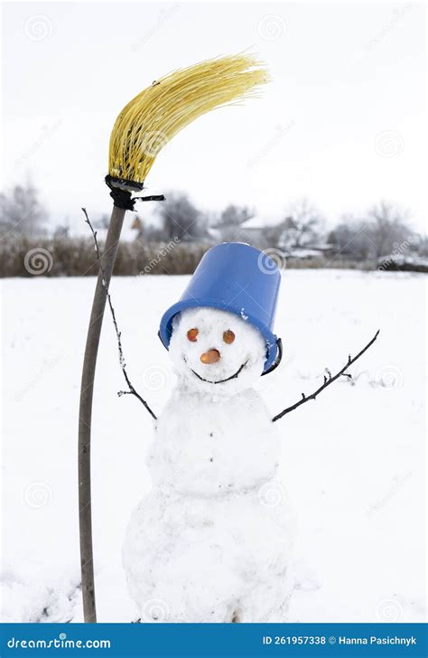 Funny Snowman With Yellow Broom And Blue Bucket On Head Winter Fun