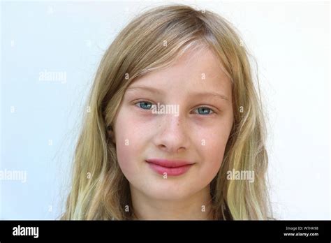 Portrait Of An Adolescent Girl With A Content Smile Stock Photo Alamy