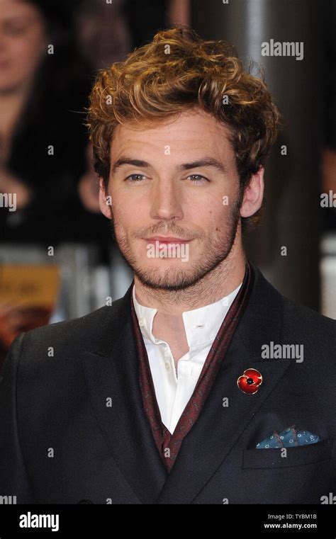 English Actor Sam Claflin Attends The World Premiere Of The Hunger Games Catching Fire At The