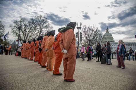 protesters dressed as guantánamo detainees hold an anti to… flickr