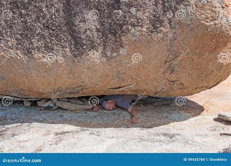 Man Crushed Under Rock Stock Photo Image Of Crushed 49435784