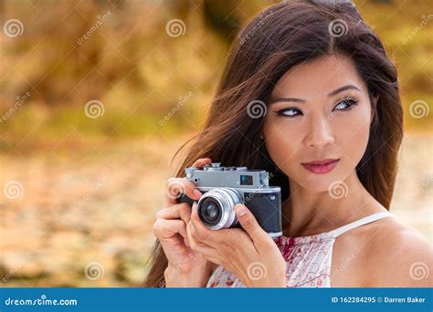 asian chinese woman girl taking photographs with retro style camera stock image image of cute