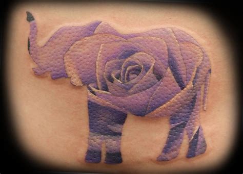 Small elephant tattoo with flowers. Elephant Rose by Matt Folse : TattooNOW
