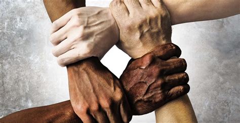 Multiracial Group With Black African American Caucasian And Asian Hands