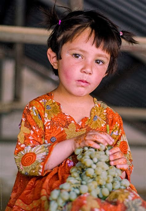 Little Girl And Grapes By Stocksy Contributor Agha Waseem Ahmed