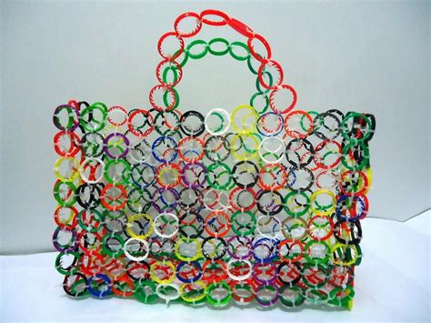 A Multicolored Handbag Made Out Of Plastic Bottle Caps Is Displayed On